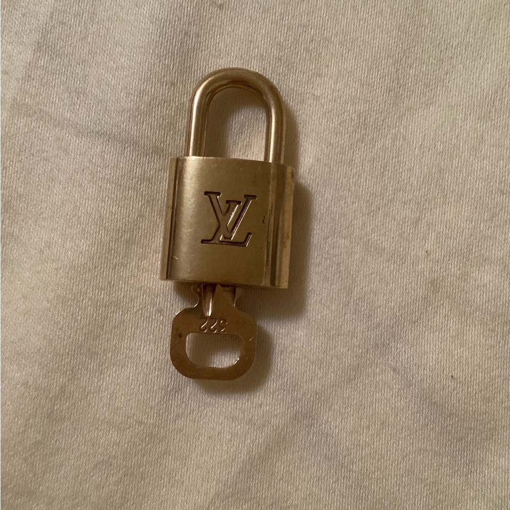 Authentic Louis Vuitton lock and key.